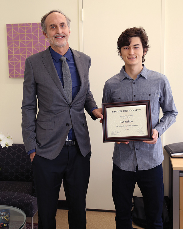 Larry Larson & Jon Nelson with Award