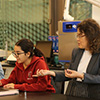 student in lab with professor