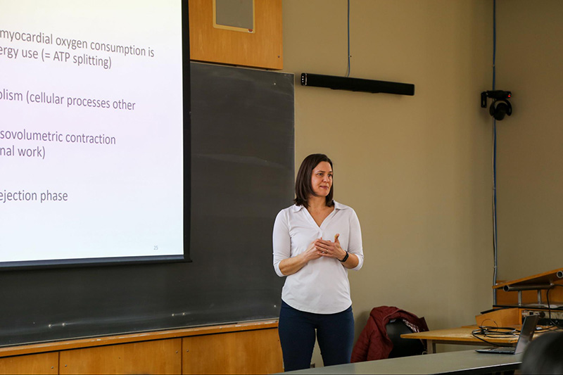 Kareen Coulombe teaching in classroom